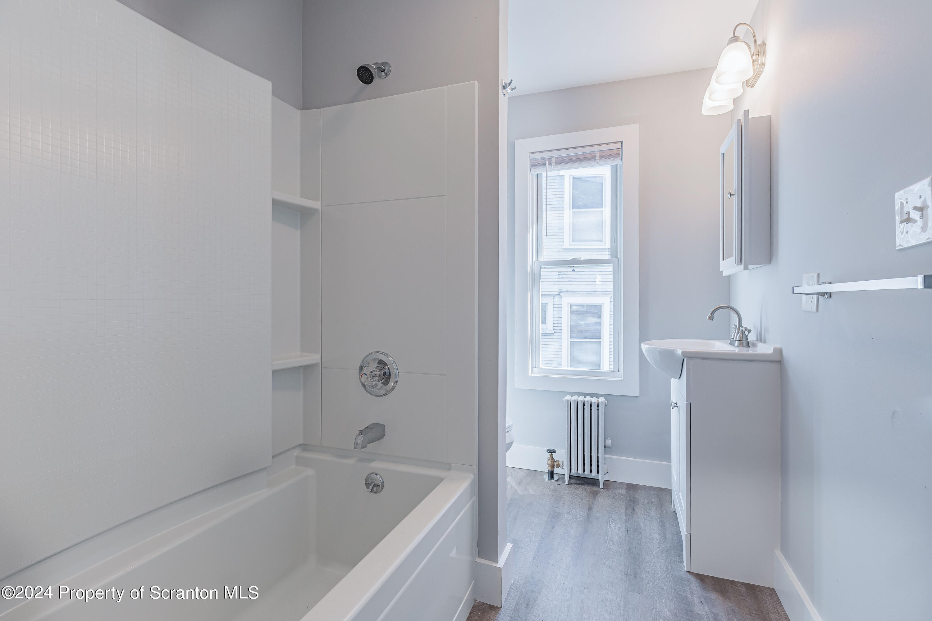 800 Quincy Avenue Scranton, PA 18510 - Photo 23 of 23 a bathroom with a bathtub and a sink