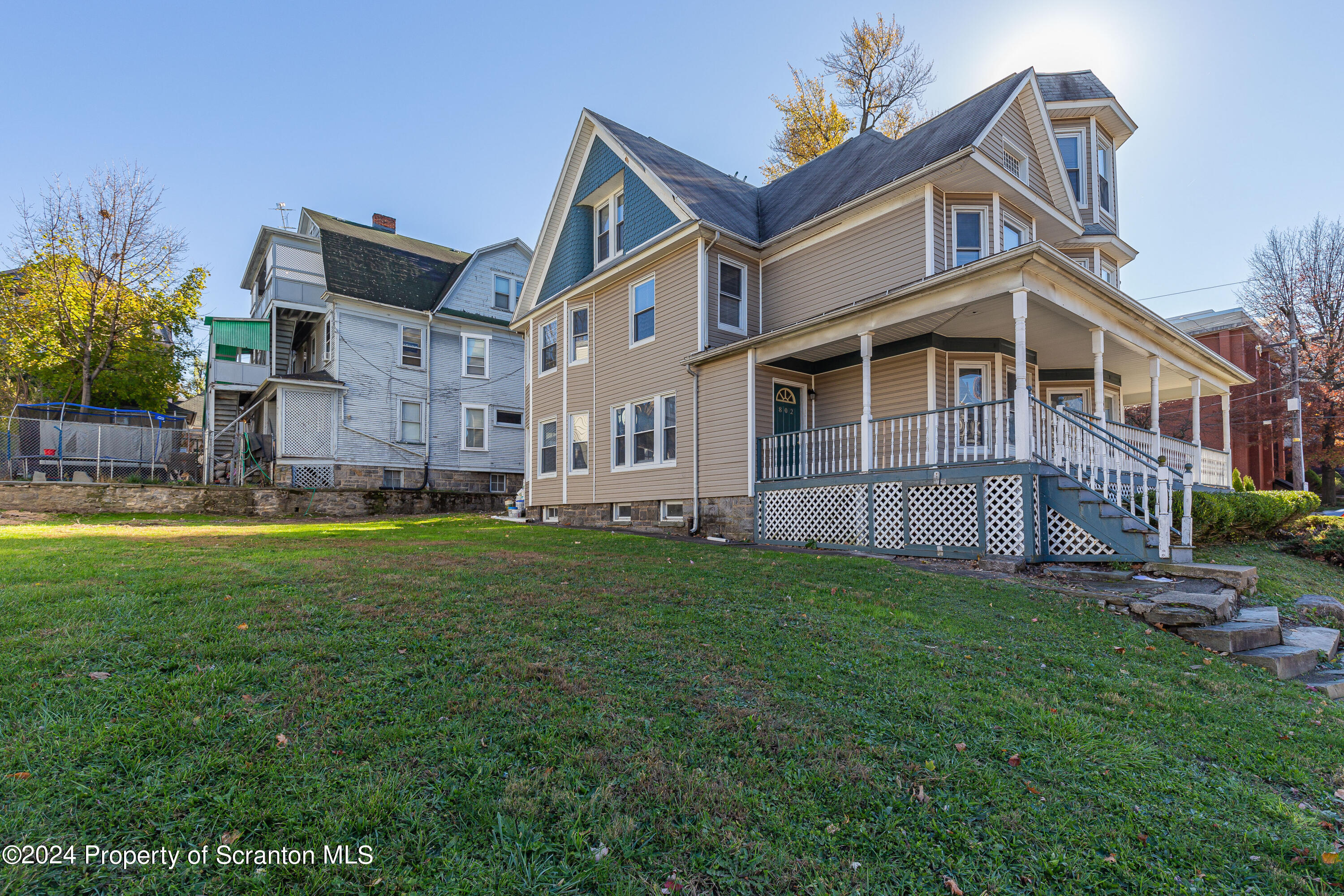 800 Quincy Avenue Scranton, PA 18510 - Photo 5 of 23 a view of a house with a yard and plants