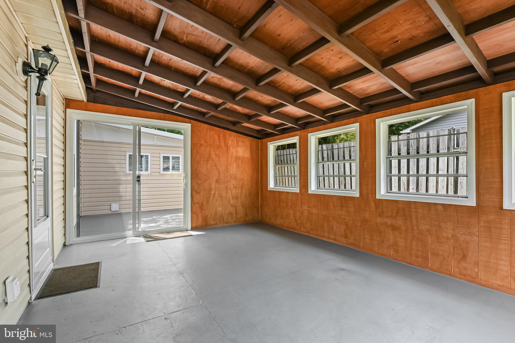 405 Bayview Drive Edgewater, MD 21037 - Photo 17 of 28 a view of an empty room with windows