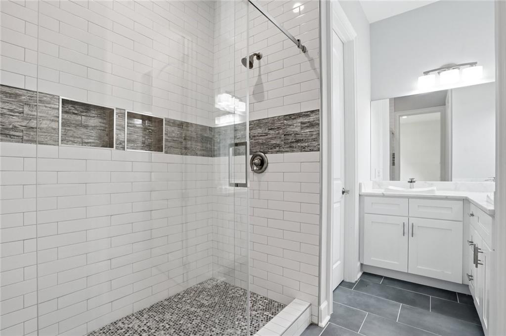2415 West Rugby Avenue Atlanta, GA 30337 - Photo 31 of 40 a bathroom with a sink and a mirror