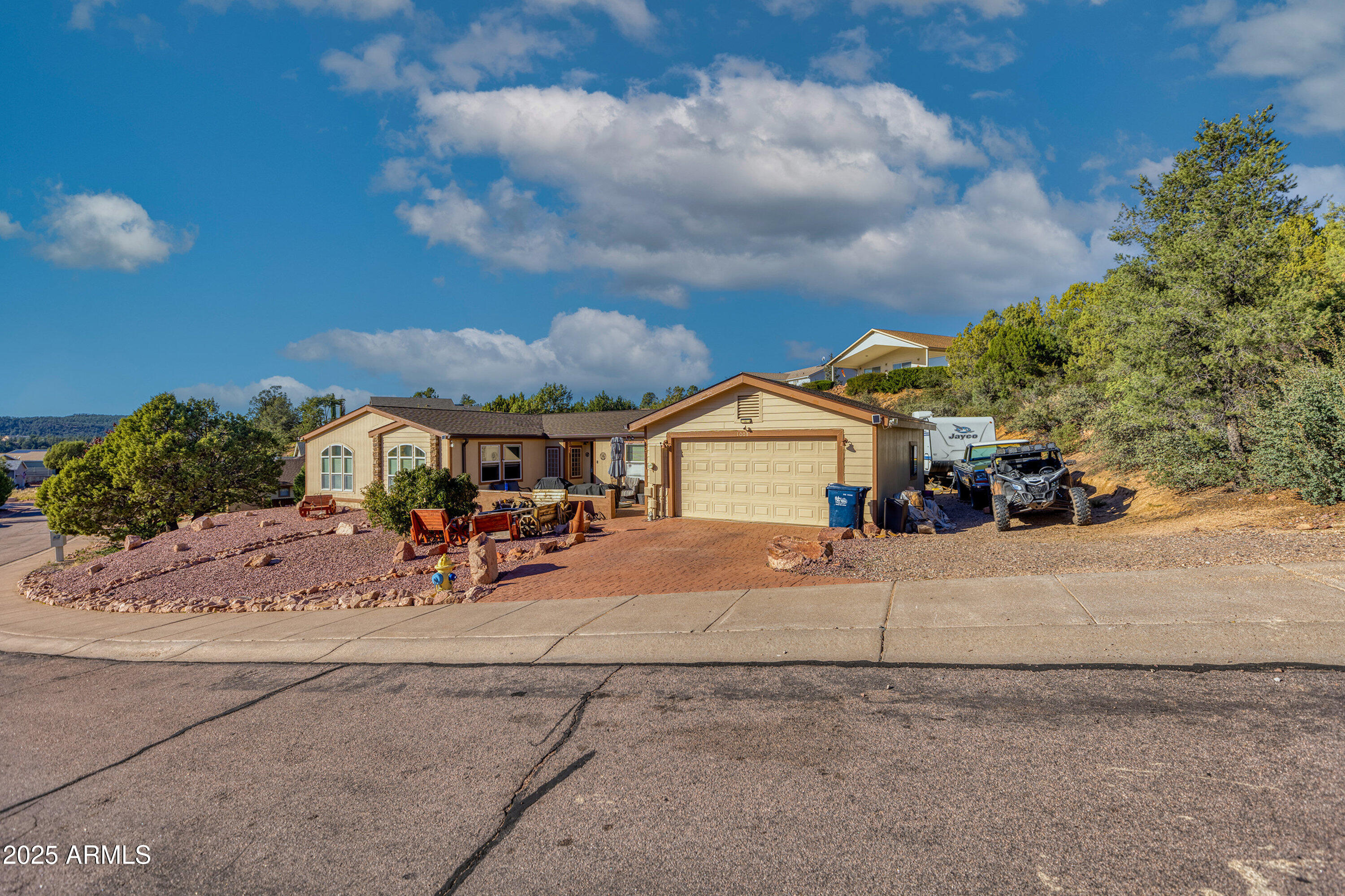 1008 West Rim View Road Payson, AZ 85541 - Photo 2 of 25 a view of a street with houses