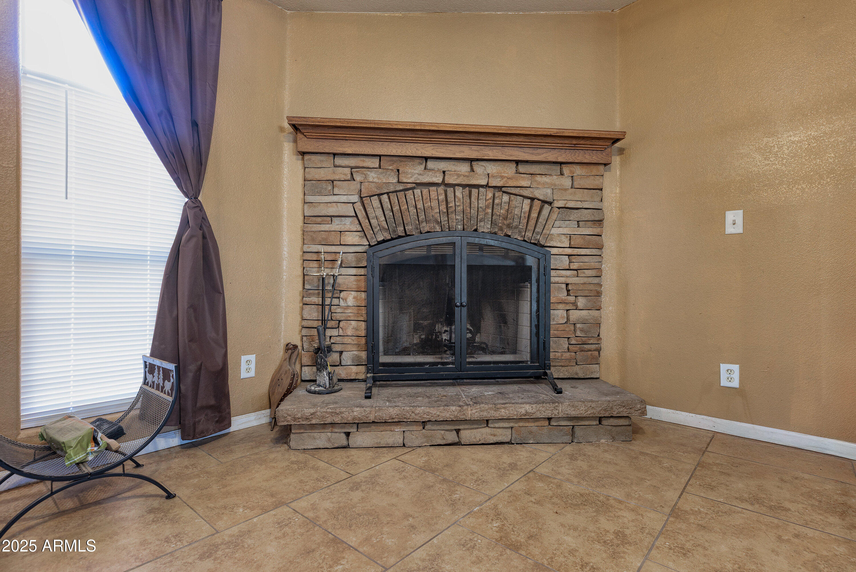 1008 West Rim View Road Payson, AZ 85541 - Photo 7 of 25 a living room with fireplace