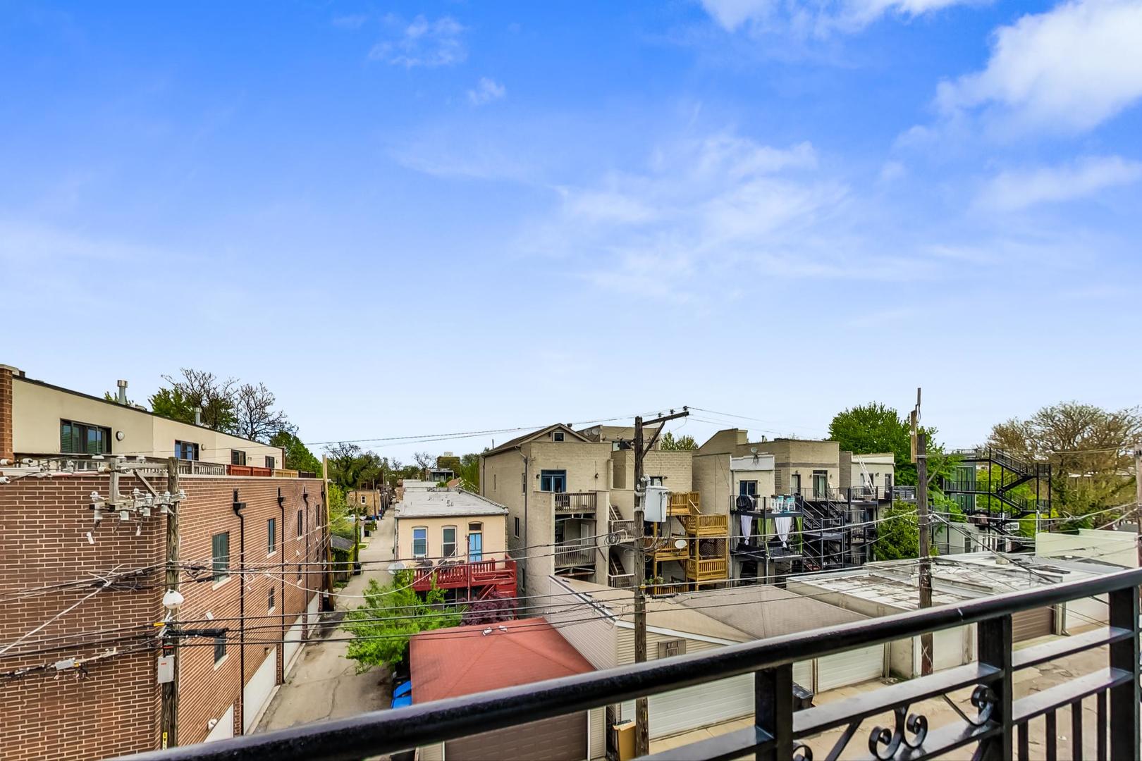 2032 West Division Street, Unit 201N Chicago, IL 60622 - Photo 18 of 18 a view of a city with tall buildings
