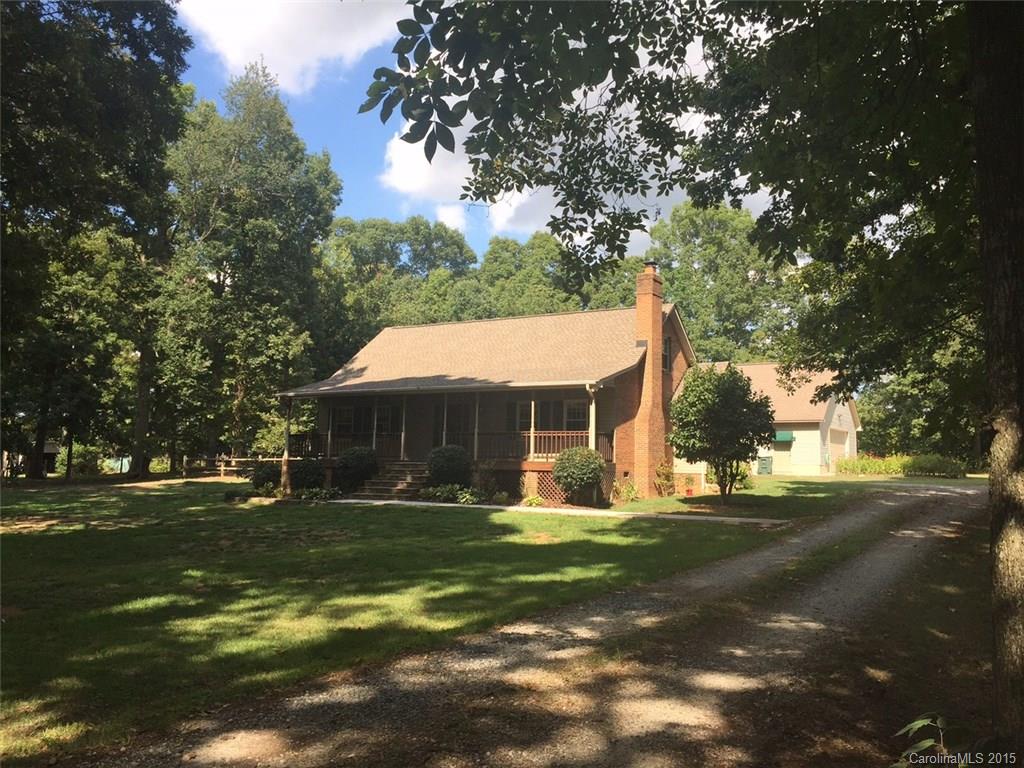 8018 Unity Church Road Kannapolis, NC 28081 - Photo 1 of 24 a front view of house with yard and green space