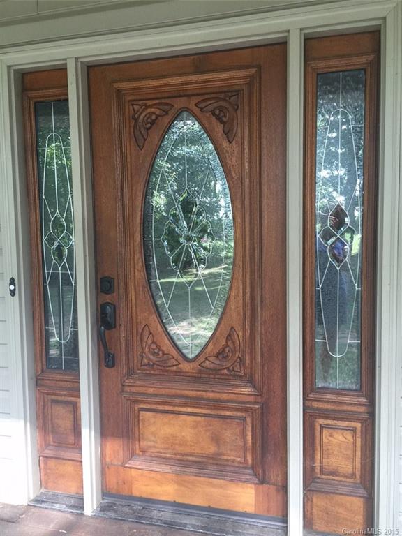 8018 Unity Church Road Kannapolis, NC 28081 - Photo 4 of 24 a view of a entryway door with wooden floor