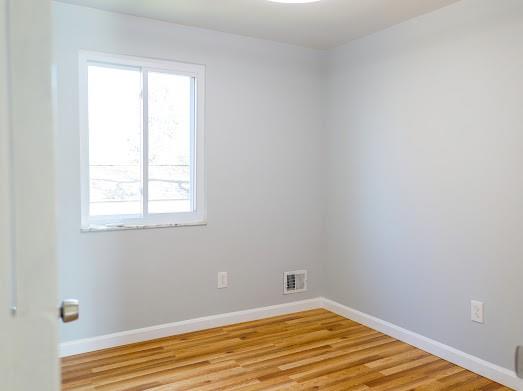 526 Magazine Street Carnegie, PA 15106 - Photo 11 of 20 a view of a room with wooden floor and a window