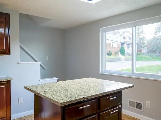 a room that has a sink and a window