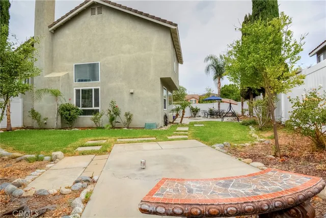a view of a backyard with a garden
