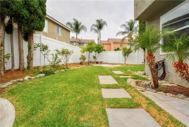 a view of a chairs and table in the patio
