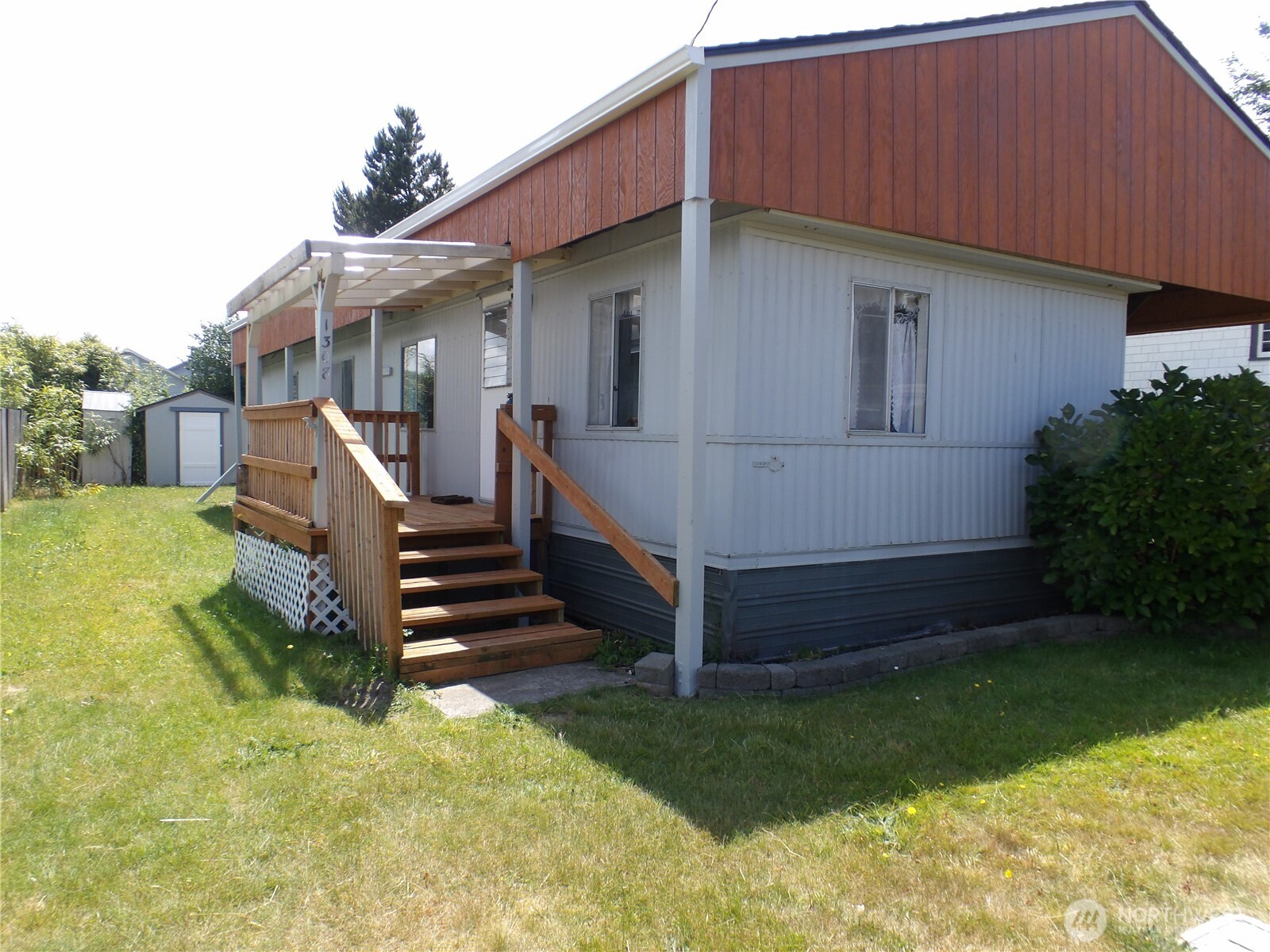 1308 263rd Place Ocean Park, WA 98640 - Photo 1 of 35 a front view of a house with a yard