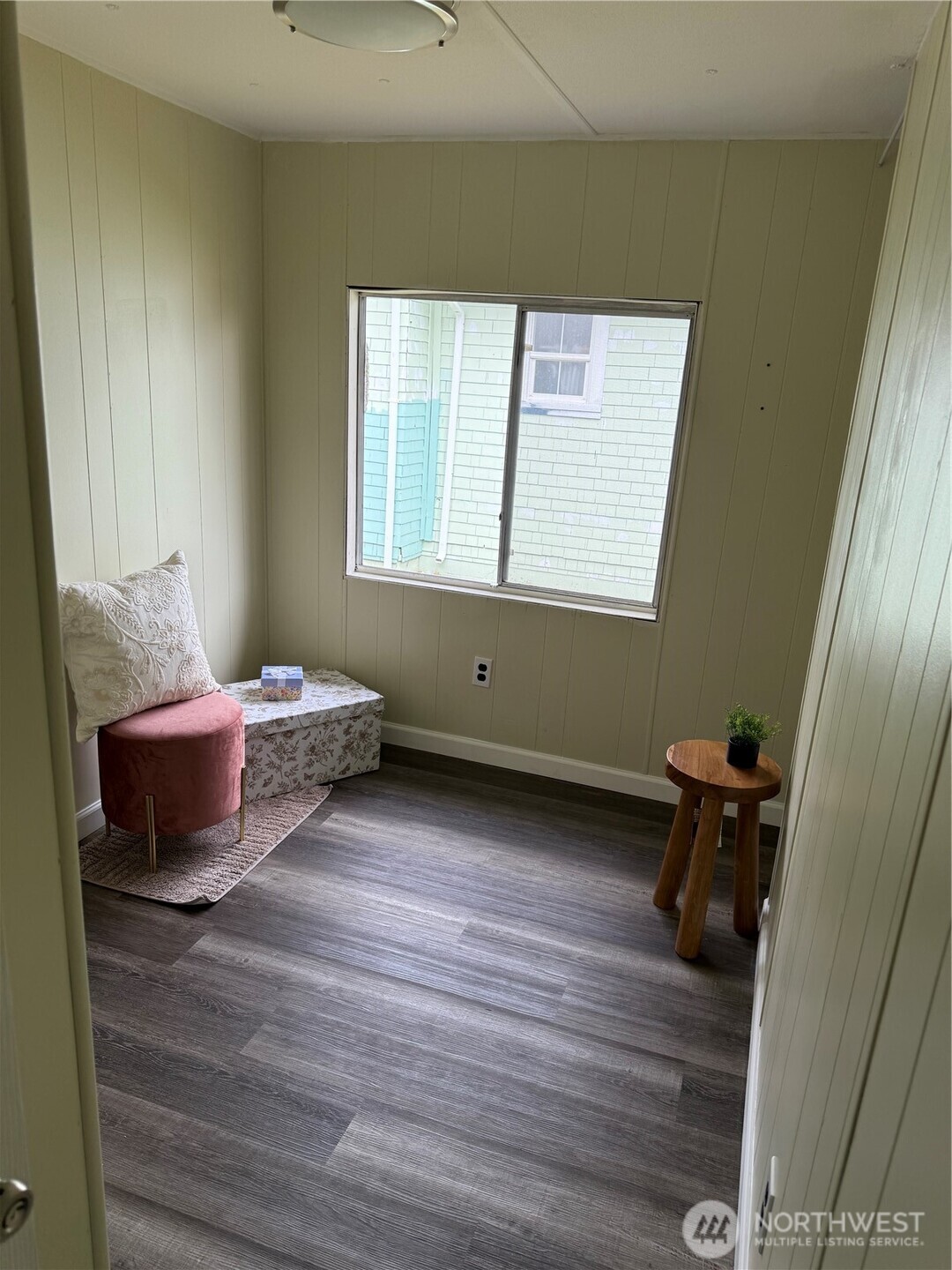 1308 263rd Place Ocean Park, WA 98640 - Photo 19 of 35 a living room with furniture and a window