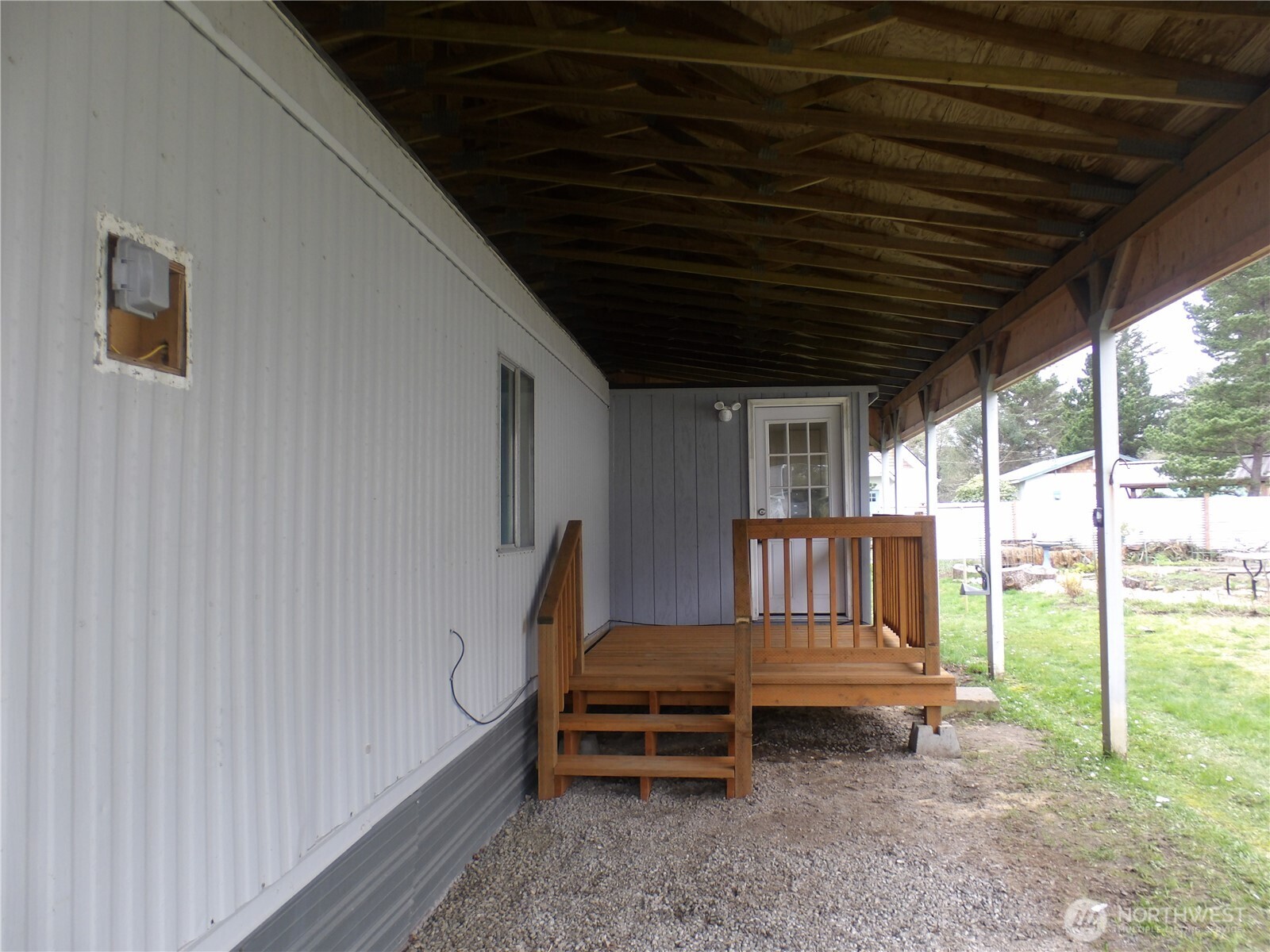 1308 263rd Place Ocean Park, WA 98640 - Photo 35 of 35 a bedroom with a bed and a bookshelf