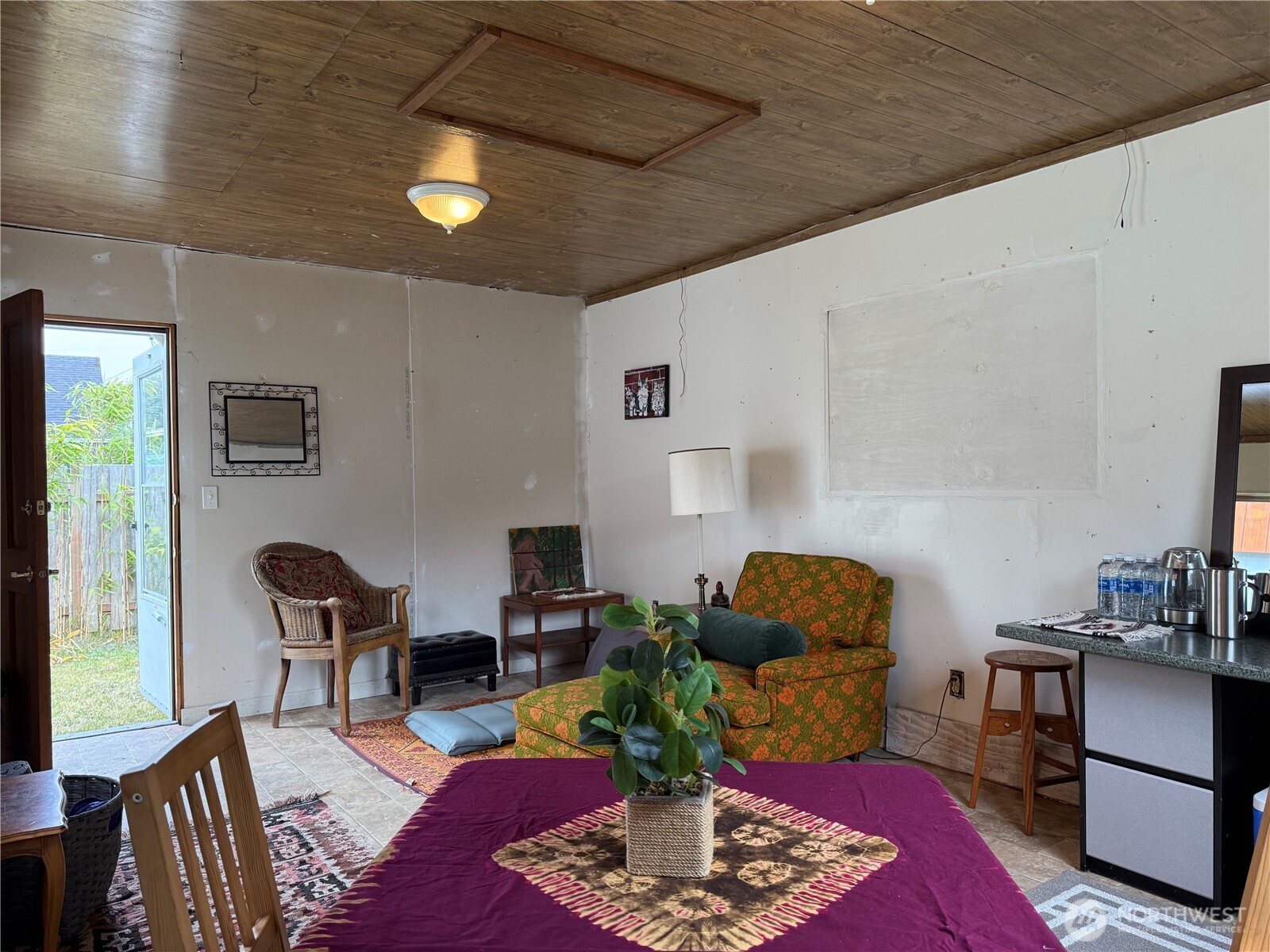 1308 263rd Place Ocean Park, WA 98640 - Photo 7 of 35 a living room with furniture and a mirror