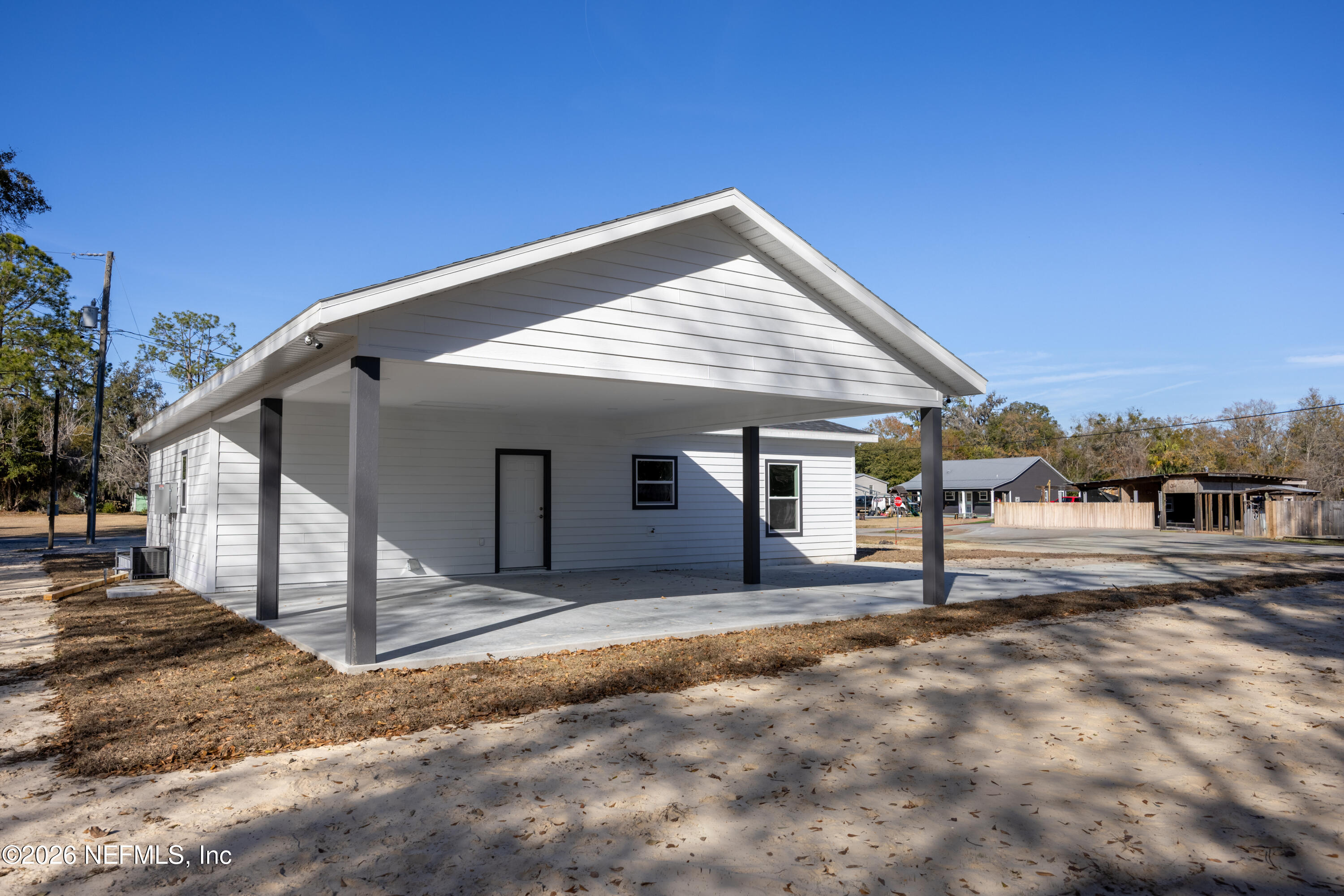 220 Southwest 3rd Street Lake Butler, FL 32054 - Photo 11 of 40 a view of a house with a backyard