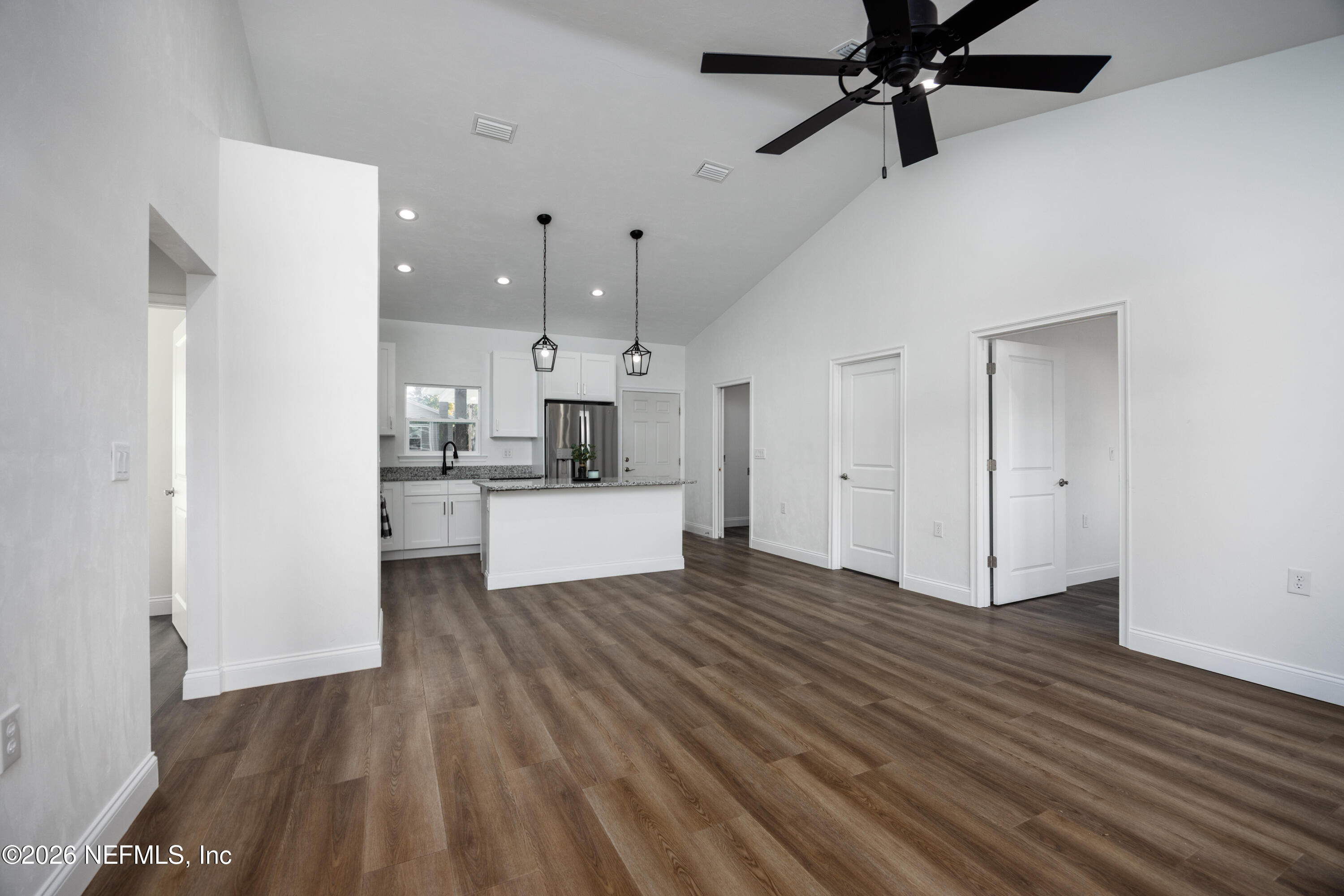 220 Southwest 3rd Street Lake Butler, FL 32054 - Photo 23 of 40 a view of a kitchen with wooden floor