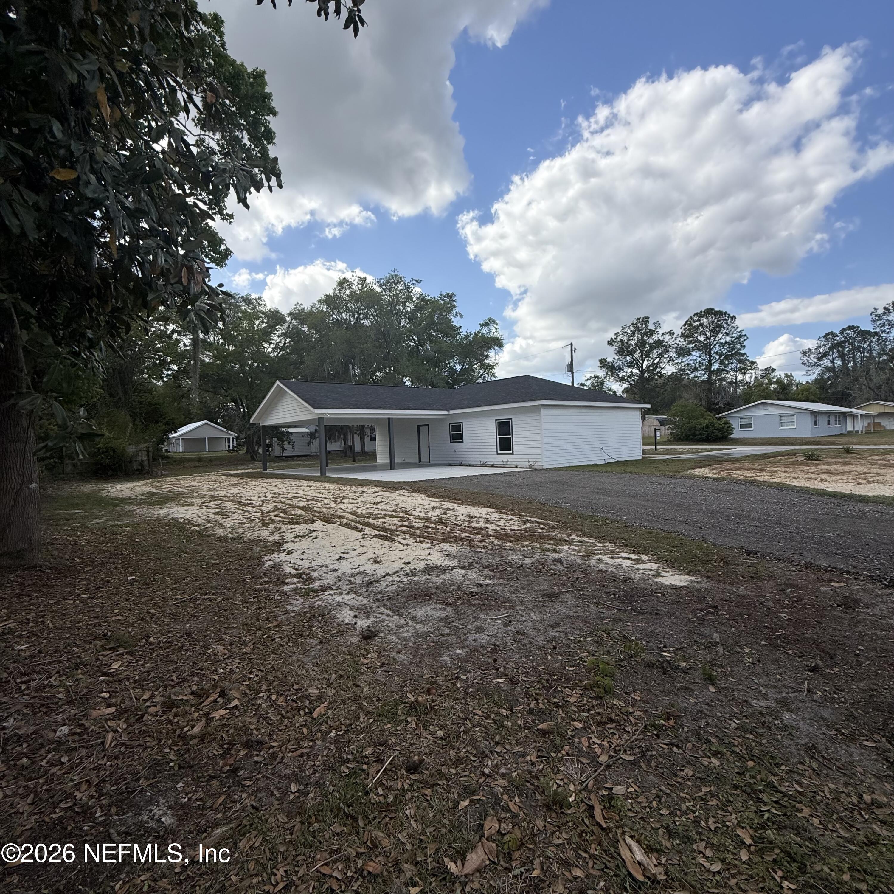 220 Southwest 3rd Street Lake Butler, FL 32054 - Photo 46 of 48 a backyard of a house with lots of green space