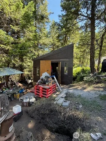 a front view of a house with yard