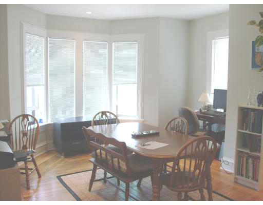 225 Carpenter Street, Unit 2 Providence, RI 02903 - Photo 3 of 9 a view of a dining room with furniture and window
