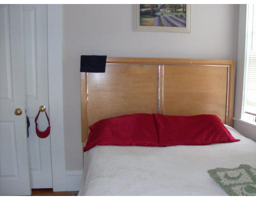 225 Carpenter Street, Unit 2 Providence, RI 02903 - Photo 5 of 9 a view of a bedroom with bed and furniture