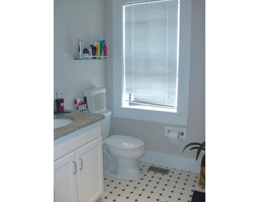 225 Carpenter Street, Unit 2 Providence, RI 02903 - Photo 7 of 9 a bathroom with a granite countertop sink a toilet and a shower