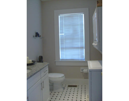 225 Carpenter Street, Unit 2 Providence, RI 02903 - Photo 8 of 9 a bathroom with a granite countertop sink a toilet and a shower