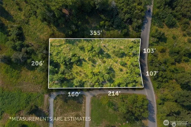 view of a yard with wooden fence