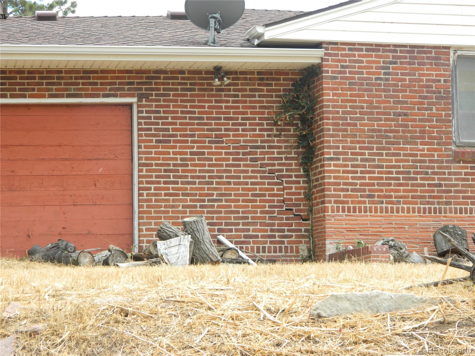 6766 Zenobia Loop Arvada, CO 80030 - Photo 14 of 38 a view of a terrace that has a wooden fence