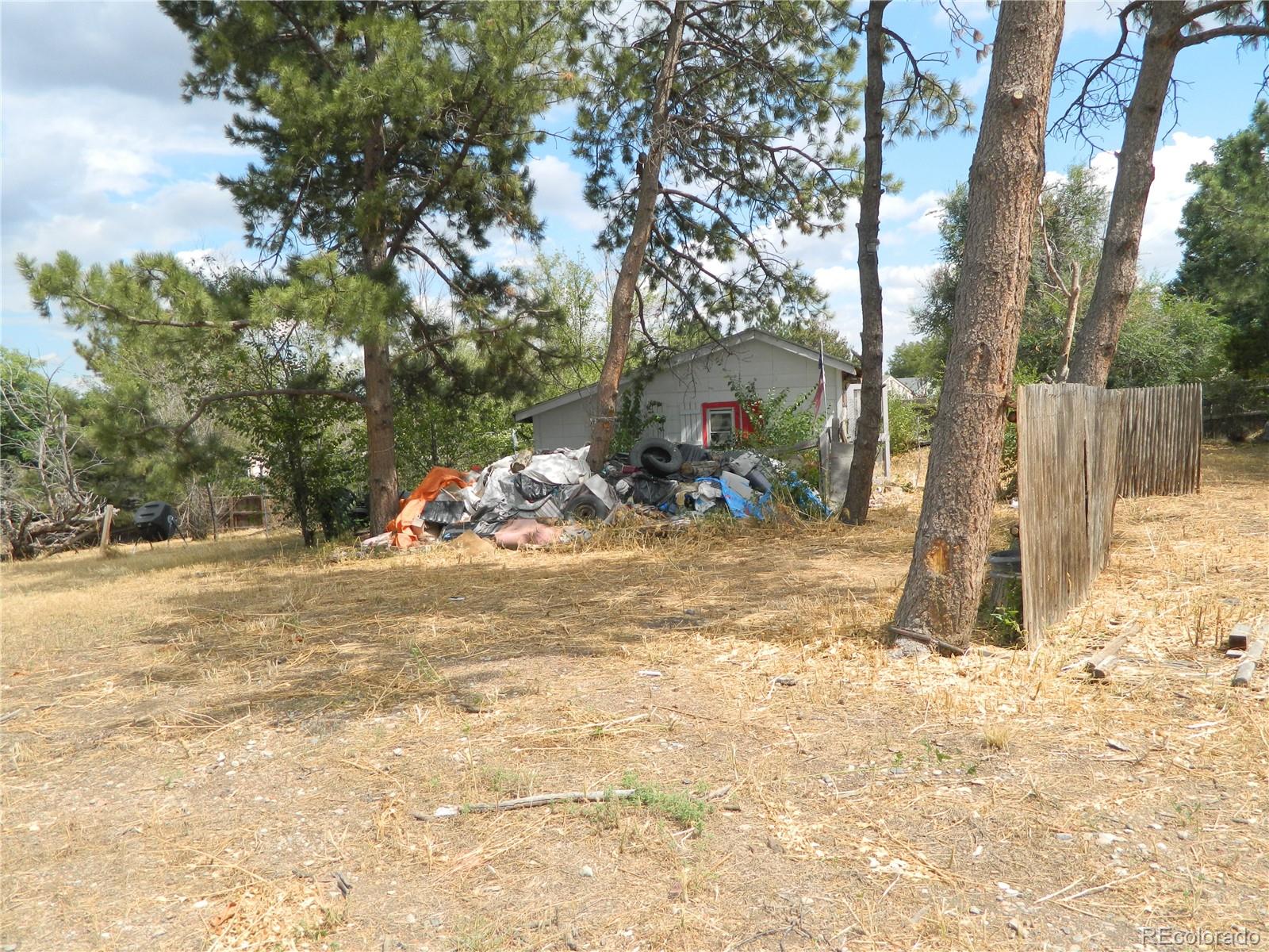 6766 Zenobia Loop Arvada, CO 80030 - Photo 17 of 38 a view of a backyard of the house