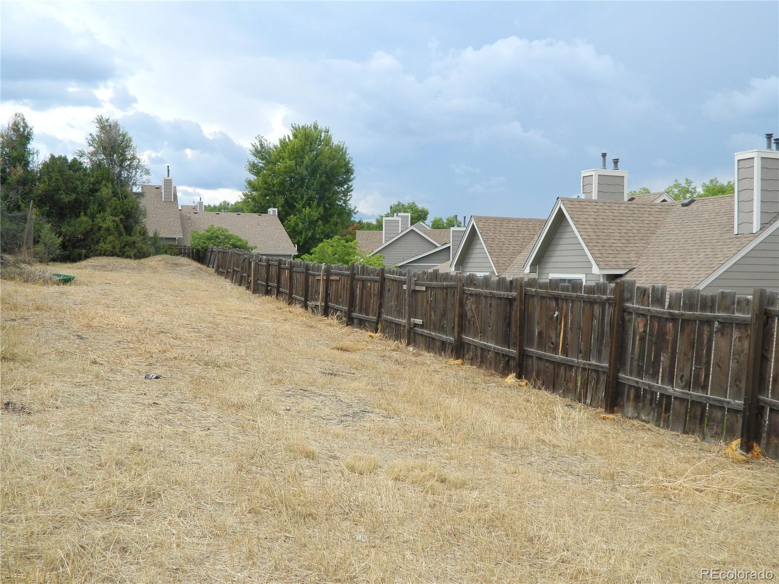 6766 Zenobia Loop Arvada, CO 80030 - Photo 18 of 38 a view of a backyard