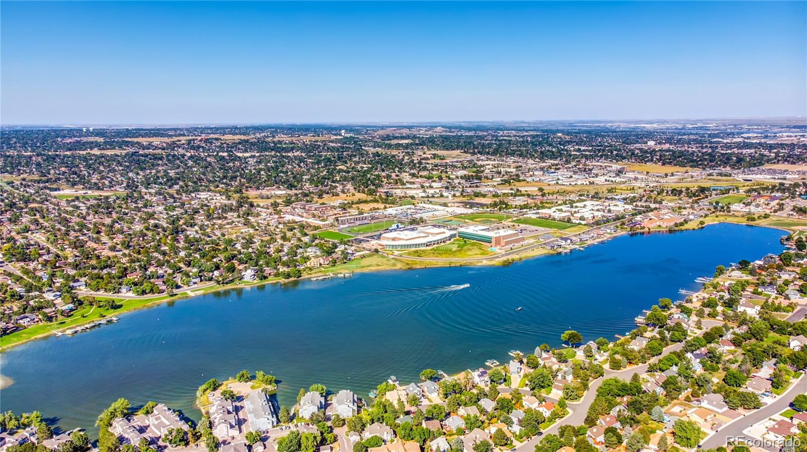 6766 Zenobia Loop Arvada, CO 80030 - Photo 27 of 38 an aerial view of ocean and residential houses with outdoor space