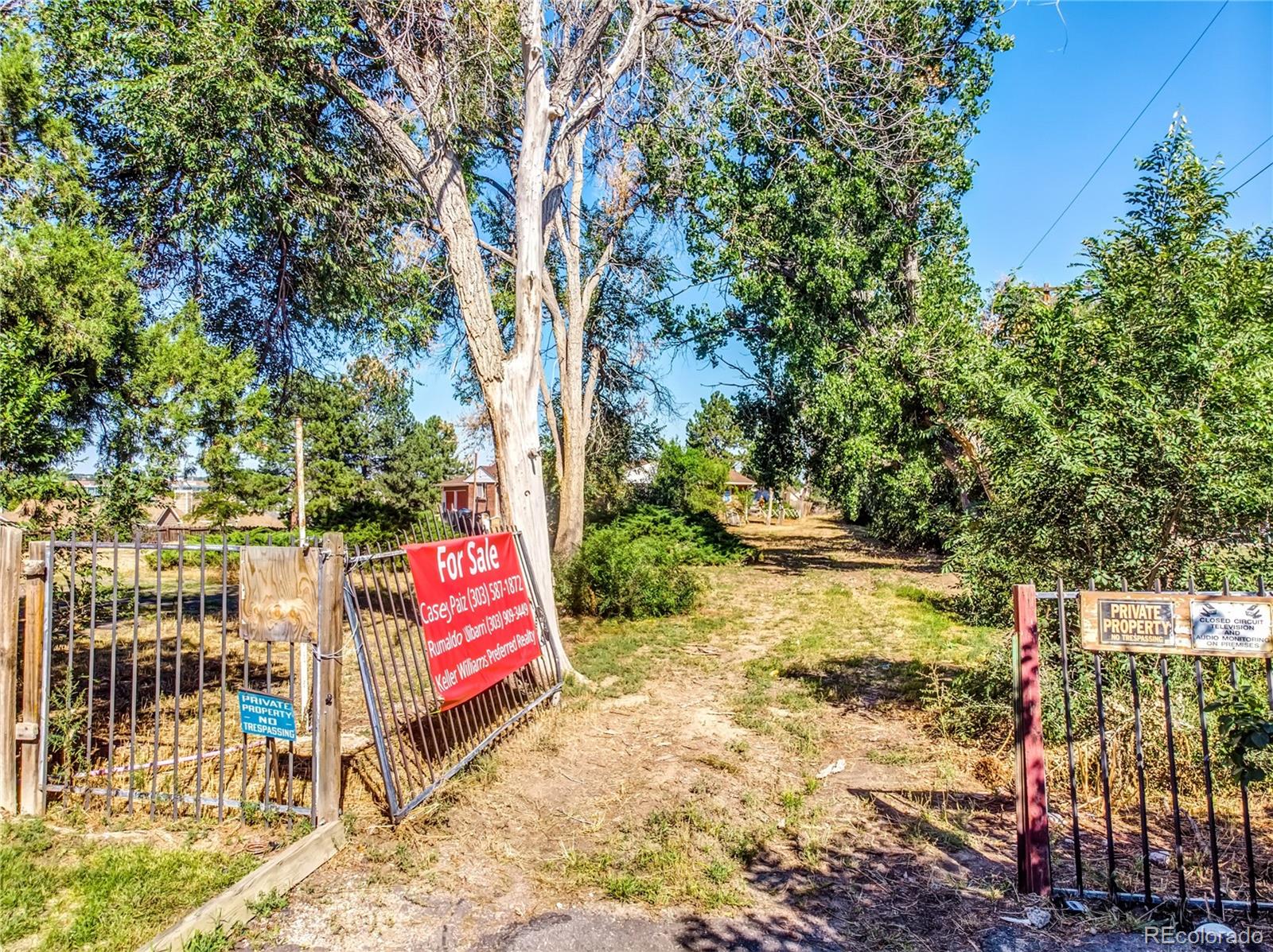 6766 Zenobia Loop Arvada, CO 80030 - Photo 35 of 38 a view of swimming pool with a patio
