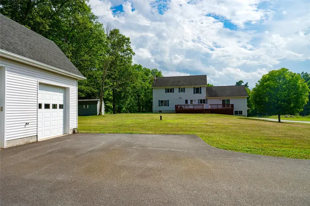 a view of a house with a big yard