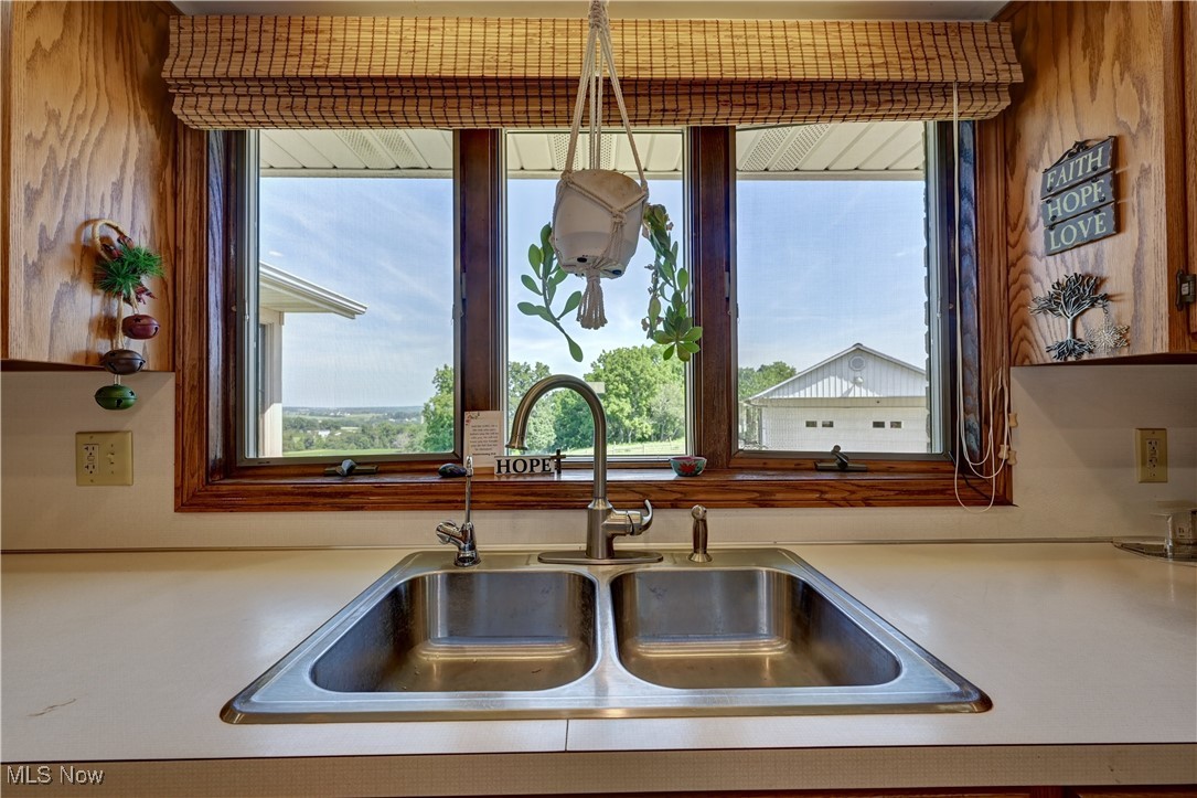 17198 Harrison Road Navarre, OH 44662 - Photo 24 of 45 Kitchen view of a sink and light countertops