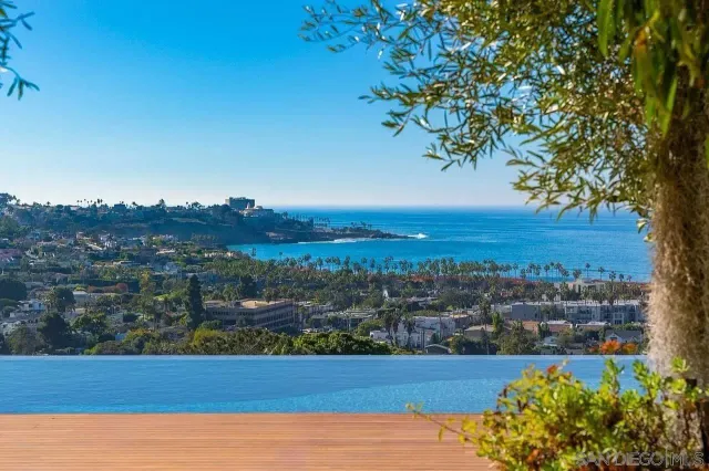 a view of city with ocean