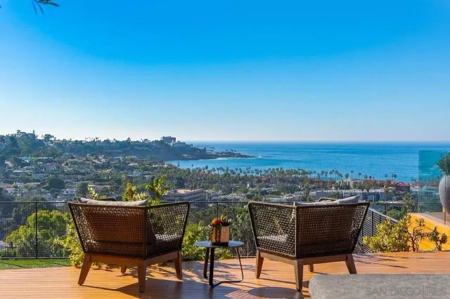 a view of a chairs and table in a terrace