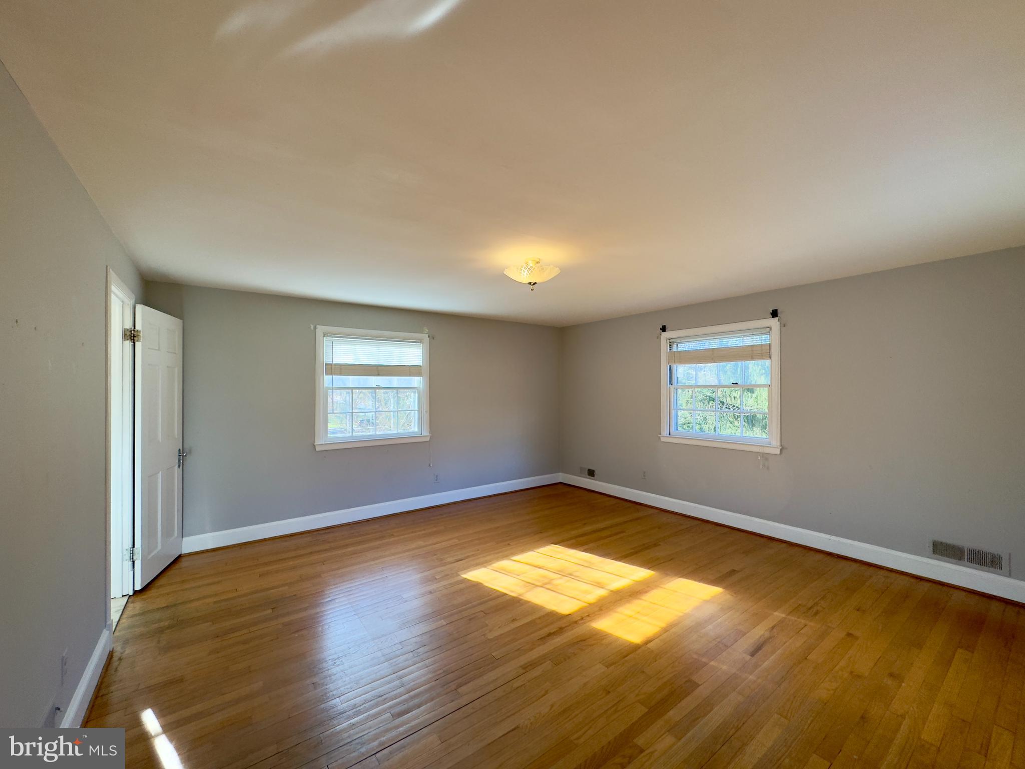 5113 North Charles Street Baltimore, MD 21210 - Photo 19 of 34 a view of a room with wooden floor and window