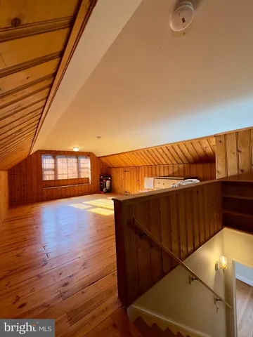 a view of a patio with wooden floor