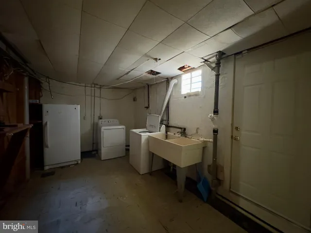 a bathroom with a sink and mirror