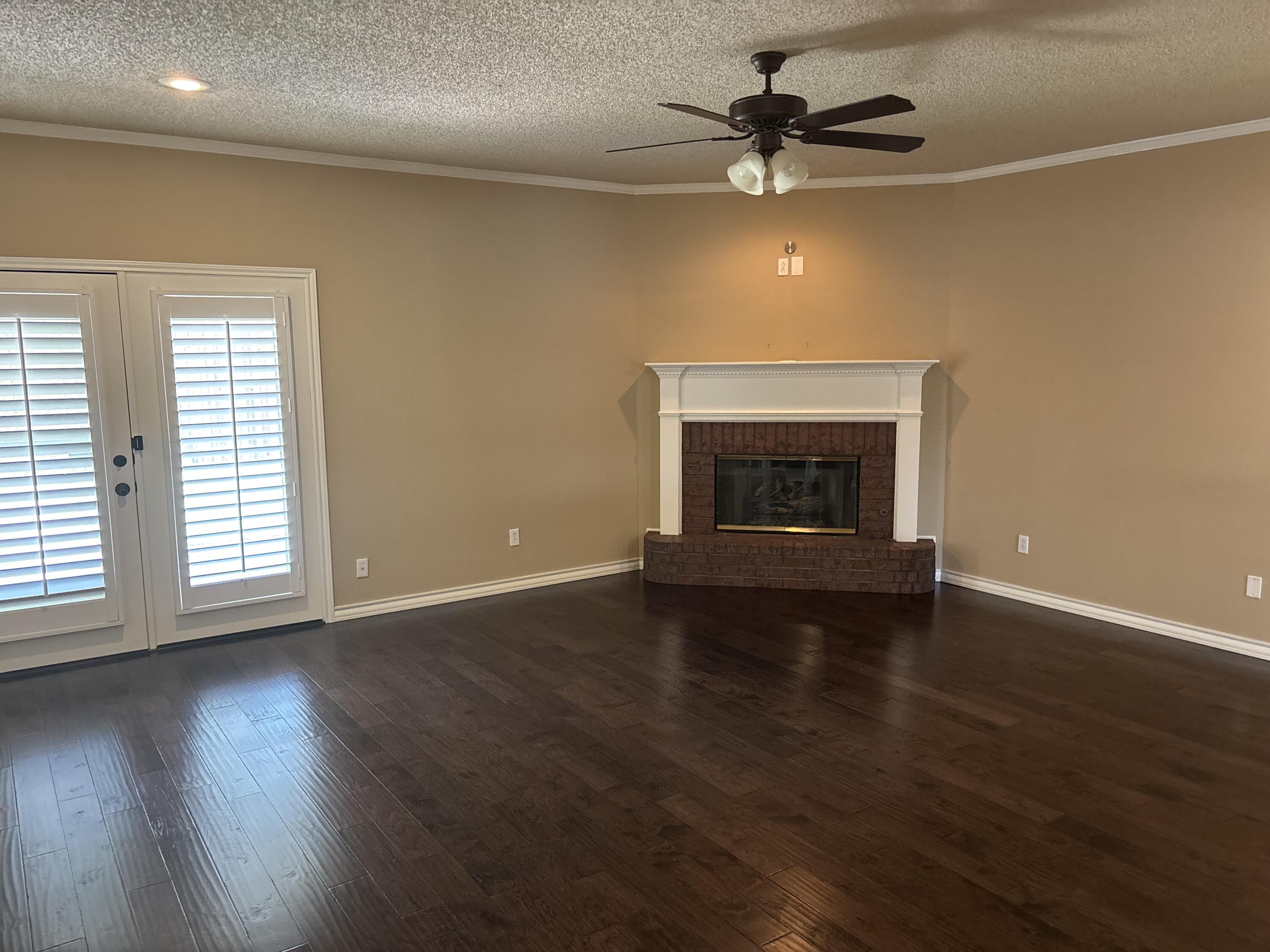 5412 99th Street Lubbock, TX 79424 - Photo 2 of 10 fireplace