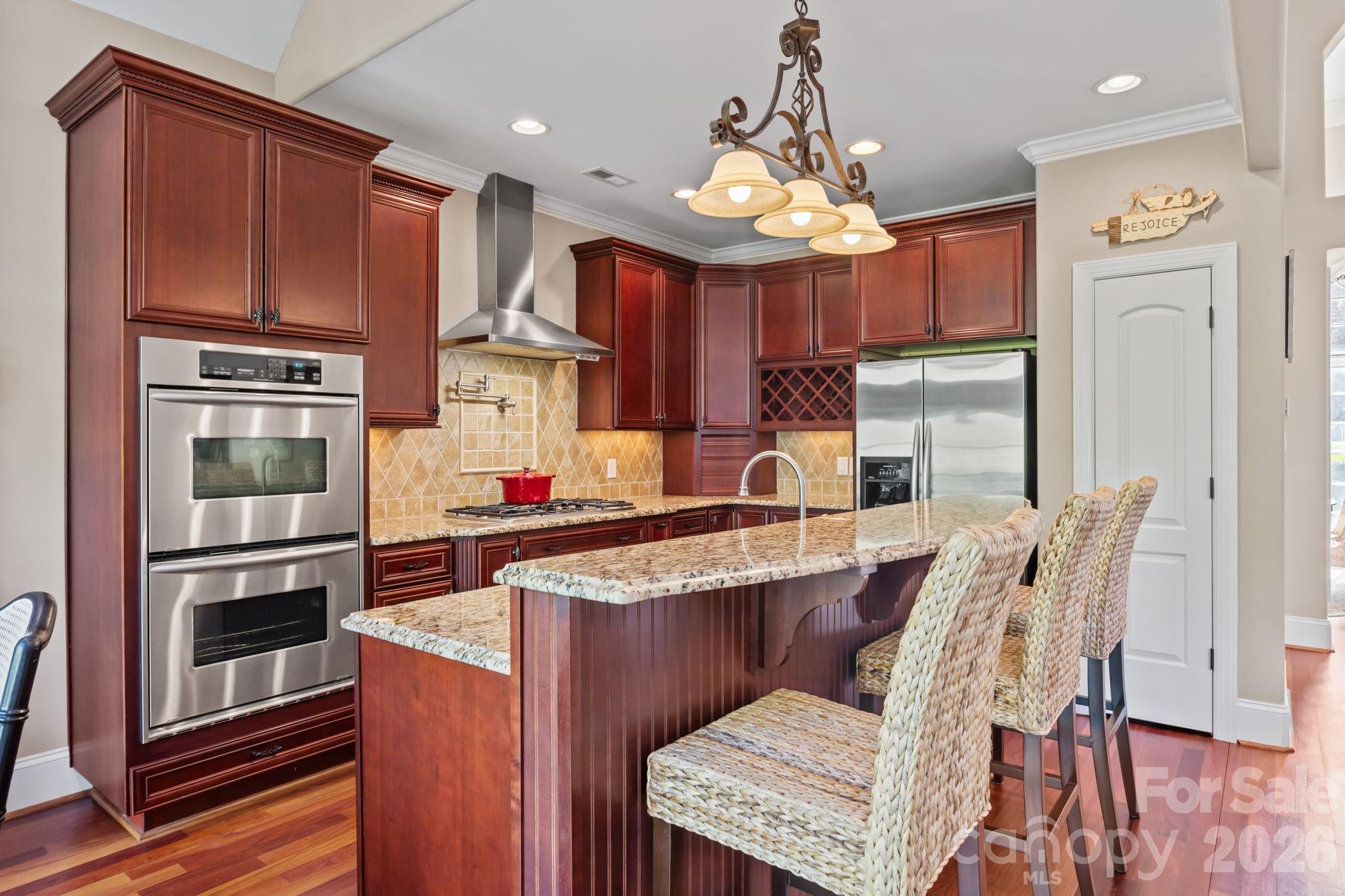120 Laurel Ridge Drive Statesville, NC 28677 - Photo 12 of 48 a kitchen with cabinets and stainless steel appliances