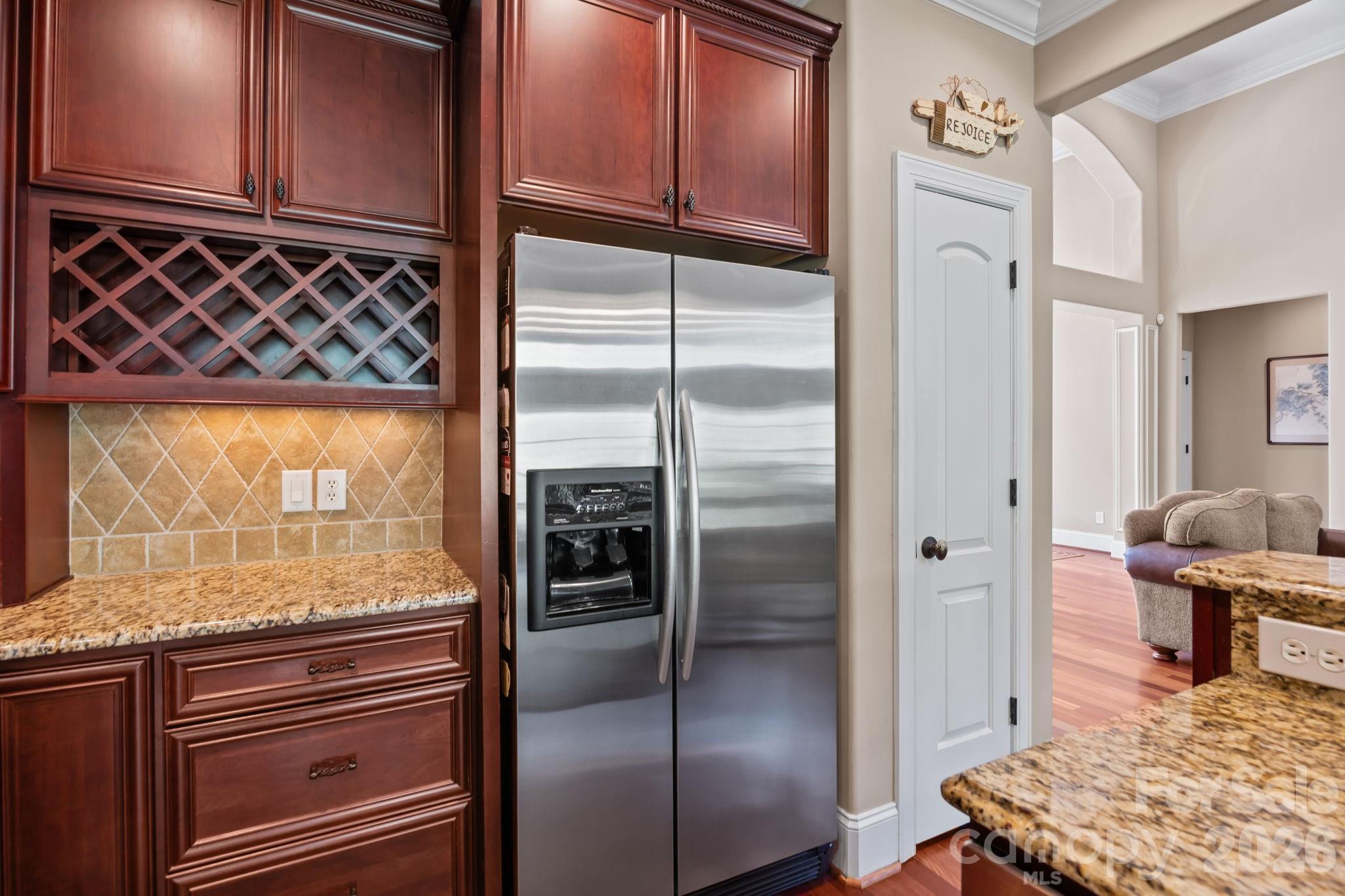 120 Laurel Ridge Drive Statesville, NC 28677 - Photo 14 of 48 a kitchen with stainless steel appliances granite countertop a refrigerator and a stove