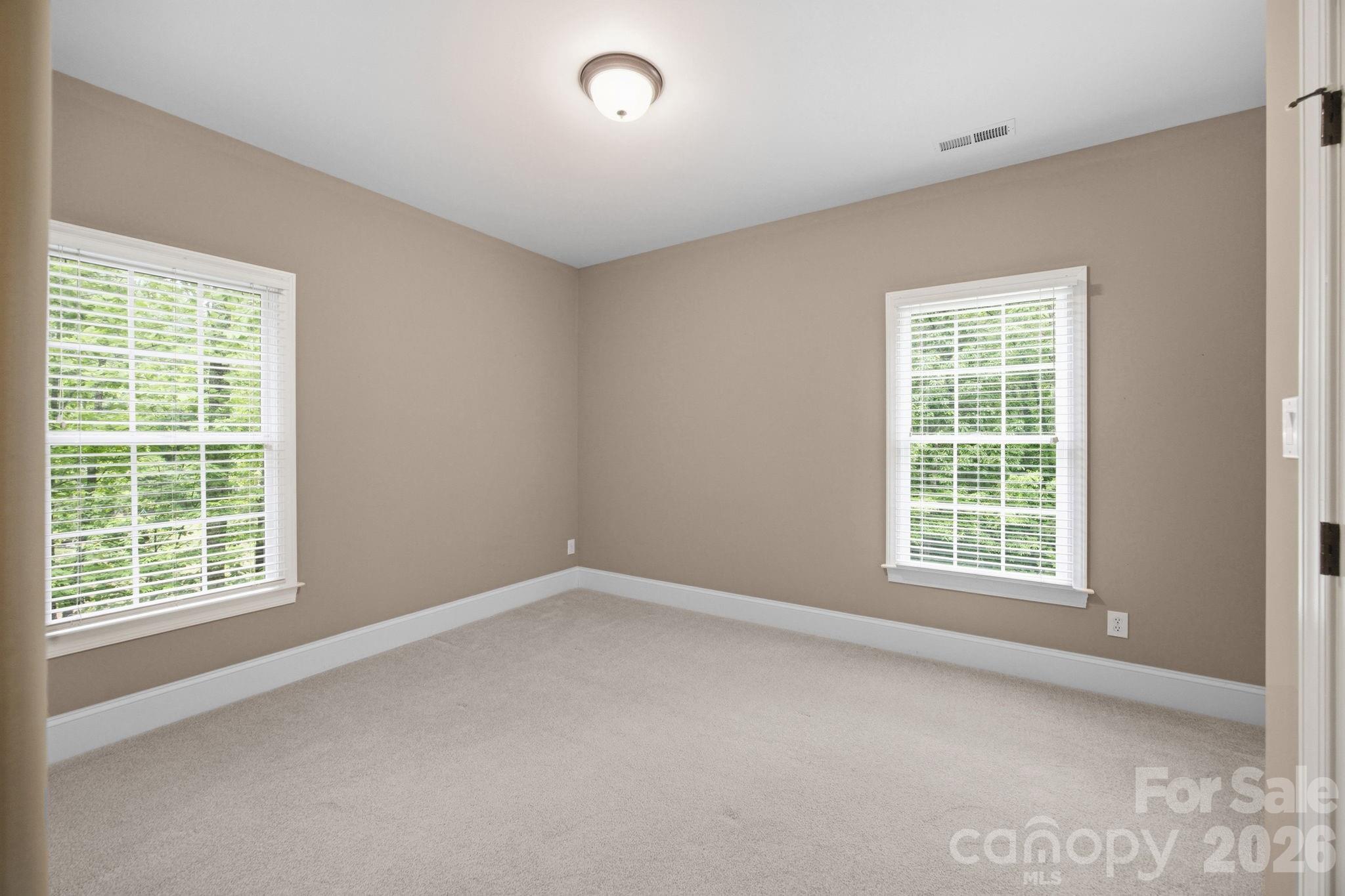 120 Laurel Ridge Drive Statesville, NC 28677 - Photo 20 of 48 a view of an empty room with a window