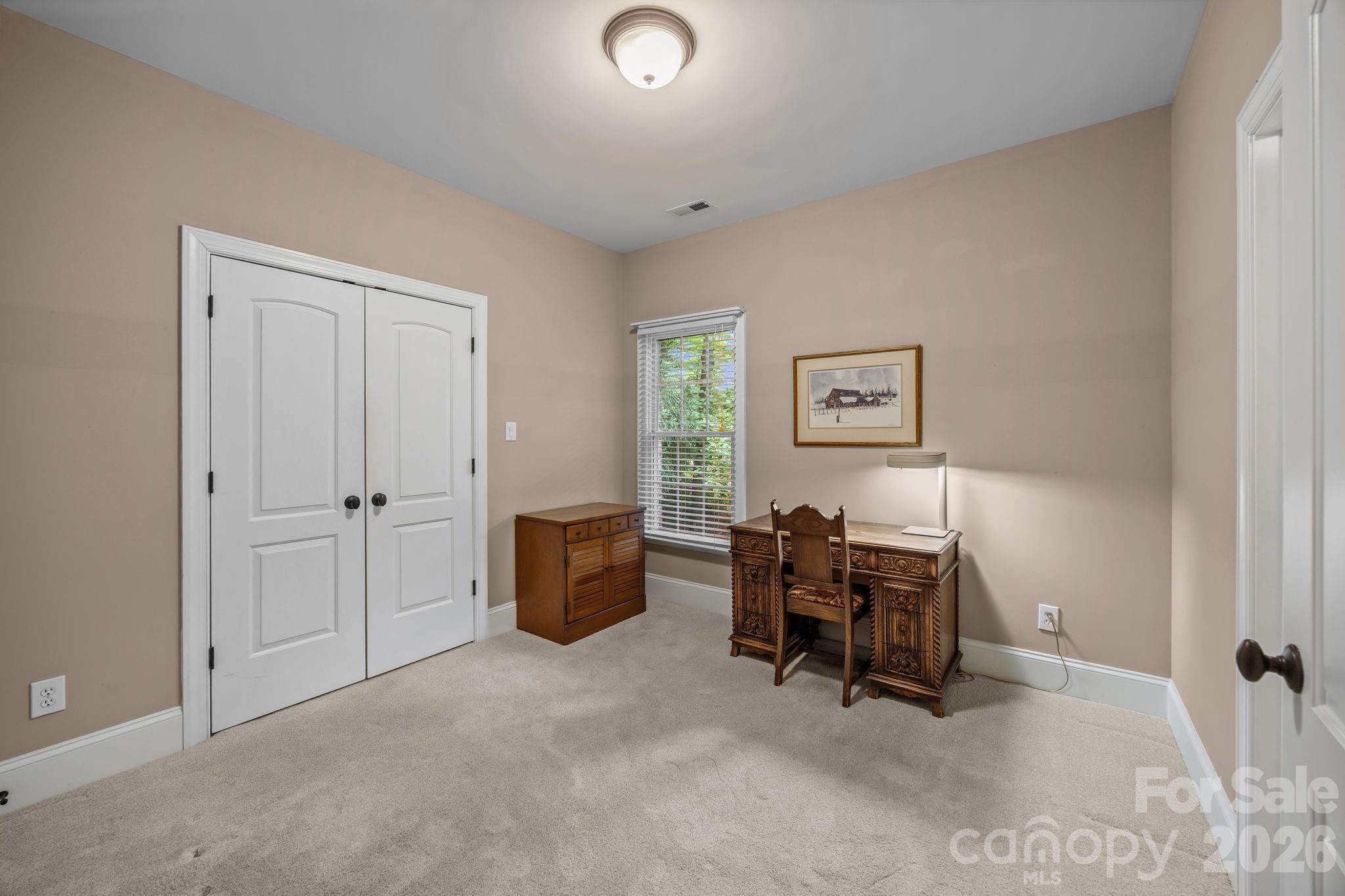 120 Laurel Ridge Drive Statesville, NC 28677 - Photo 24 of 48 a view of a workspace with furniture and a window