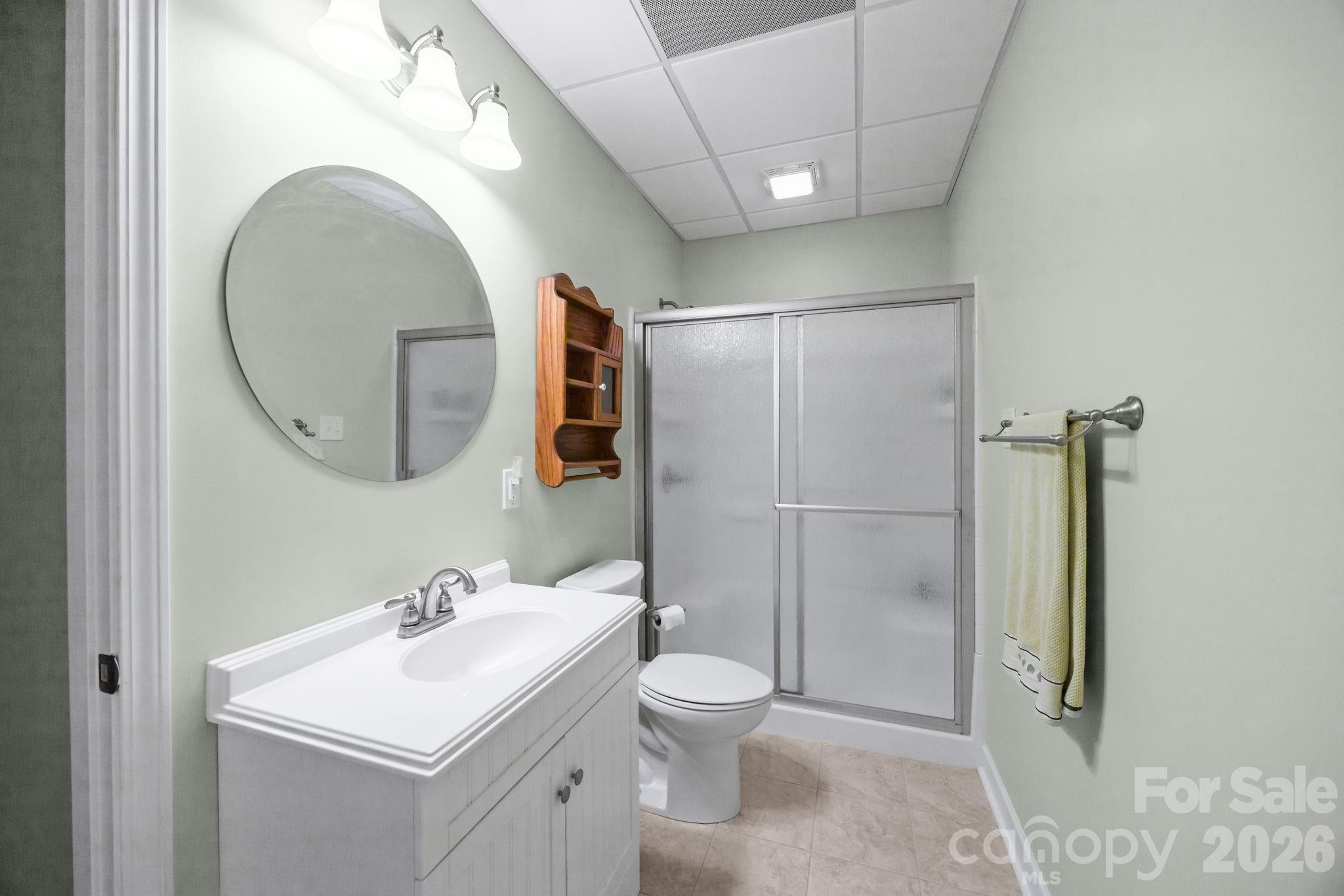 120 Laurel Ridge Drive Statesville, NC 28677 - Photo 28 of 48 a bathroom with a toilet sink and mirror
