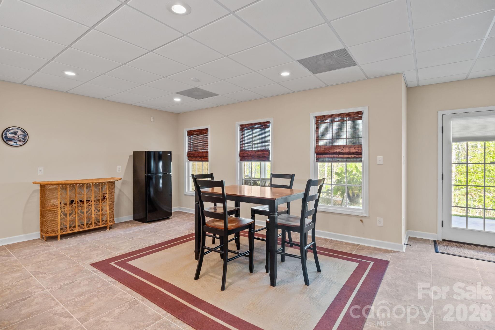 120 Laurel Ridge Drive Statesville, NC 28677 - Photo 30 of 48 a view of a dining room with furniture window and wooden floor