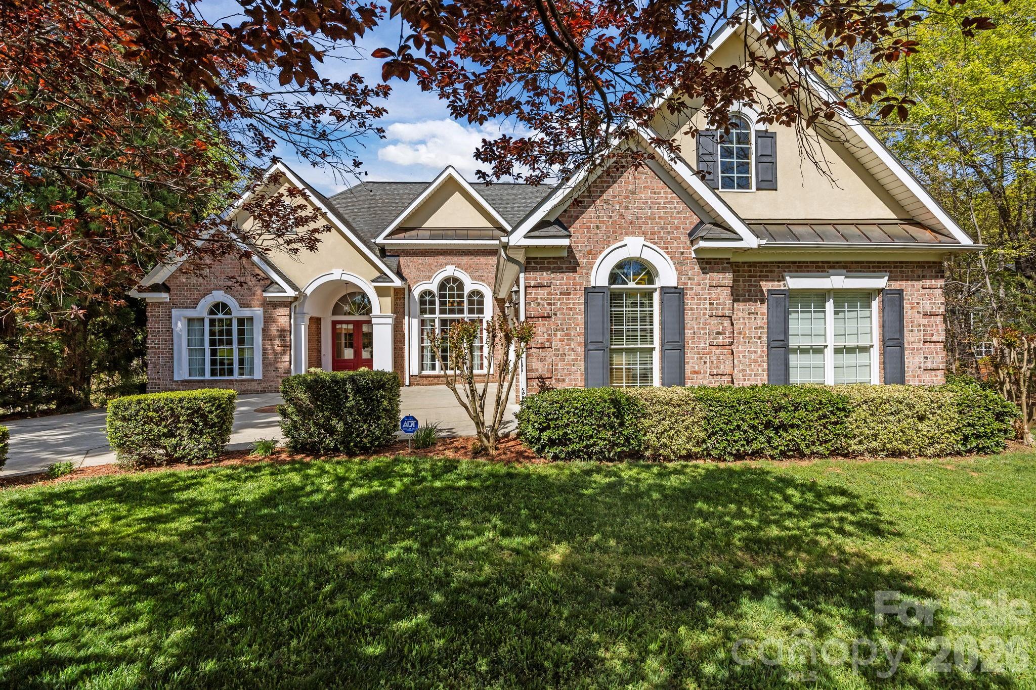 120 Laurel Ridge Drive Statesville, NC 28677 - Photo 3 of 48 a front view of a house with a yard