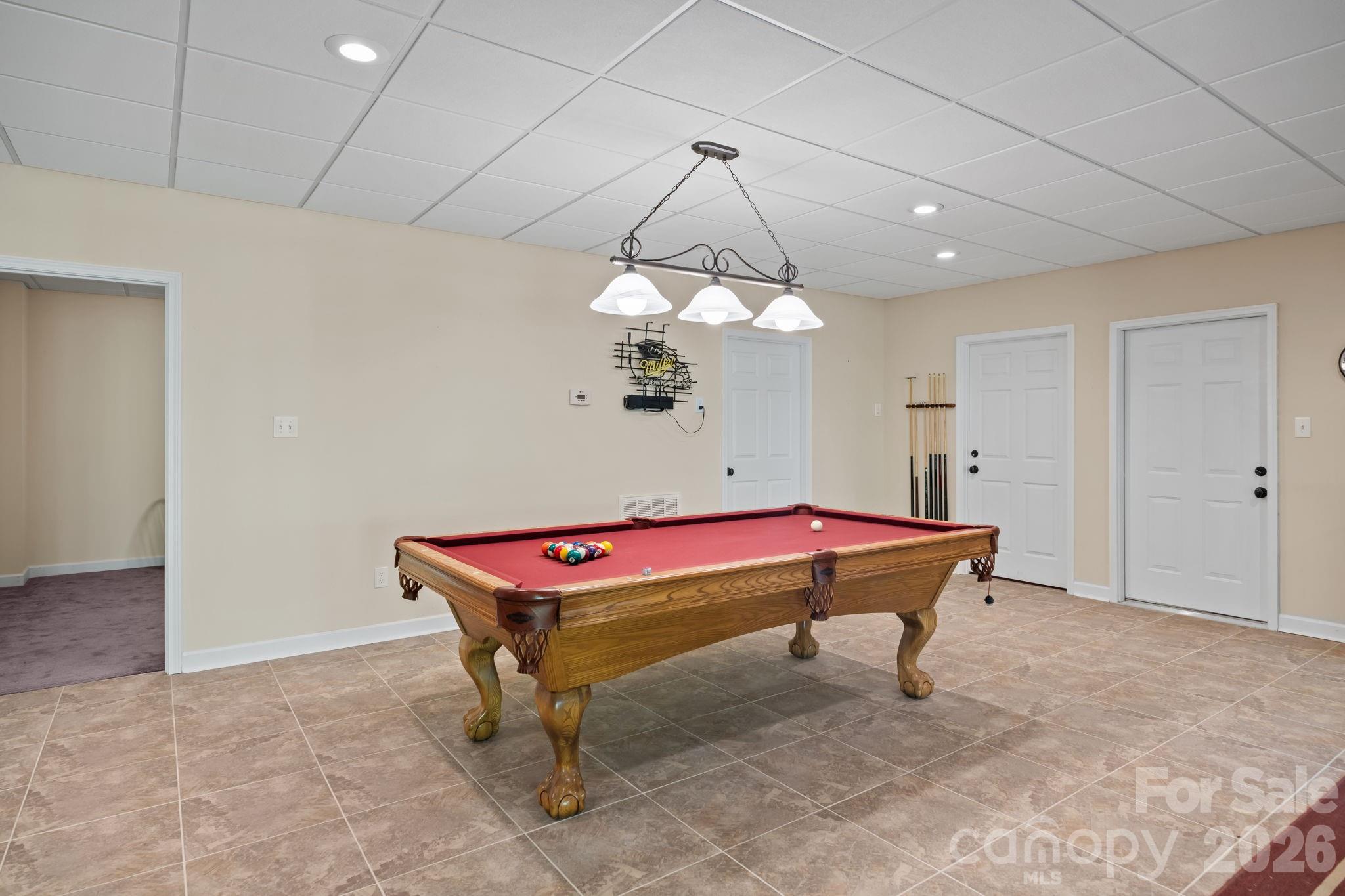 120 Laurel Ridge Drive Statesville, NC 28677 - Photo 31 of 48 a room with pool table and wooden floor