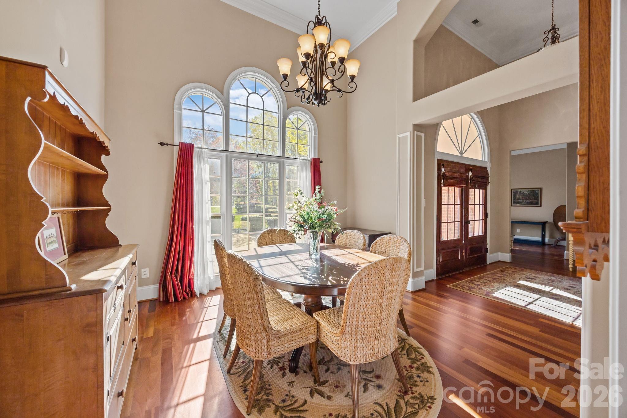 120 Laurel Ridge Drive Statesville, NC 28677 - Photo 6 of 48 a view of a dining room with furniture and a chandelier