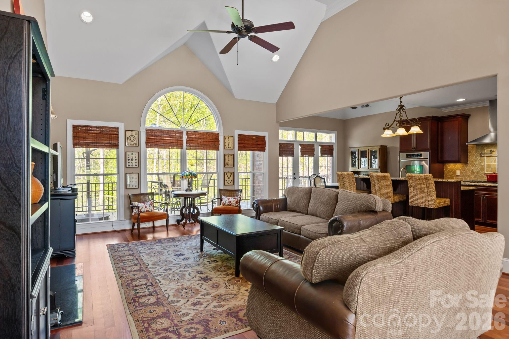 120 Laurel Ridge Drive Statesville, NC 28677 - Photo 9 of 48 a living room with furniture fireplace and a large window