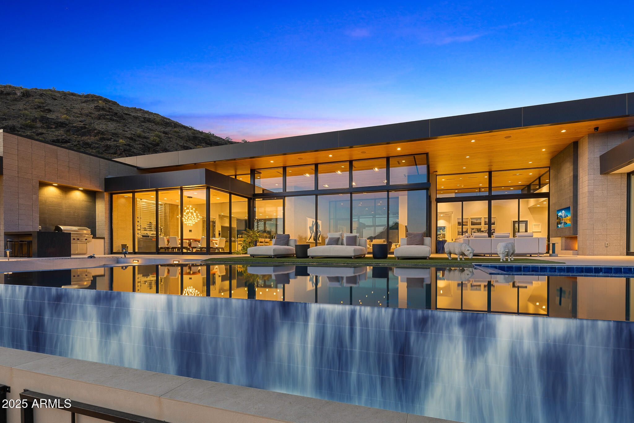 6149 East Indian Bend Road Paradise Valley, AZ 85253 - Photo 66 of 77 a view of a swimming pool and outdoor seating